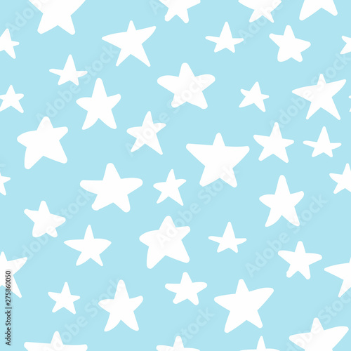 Seamless pattern with hand drawn stars on blue background. Sky background. Vector illustration.