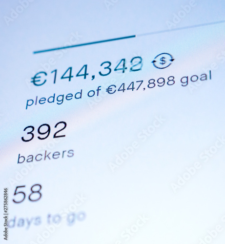 Generic digital screen display featuring crowdfunding project with fast changing sum of money pledged of a total by 385 bayrs with 58 days to go - modern crowdfunding website