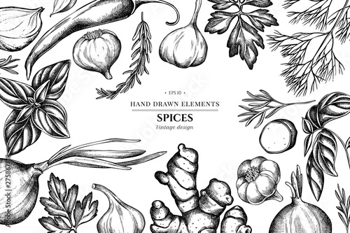 Floral design with black and white onion, garlic, pepper, greenery, ginger, basil, rosemary