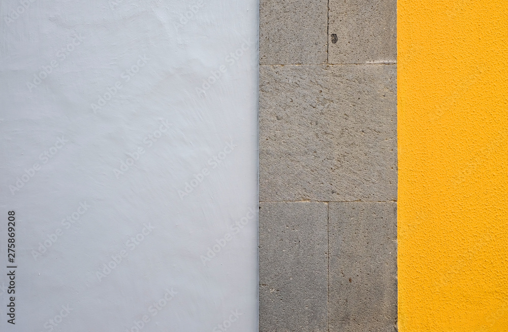 Fototapeta premium Wall panels in colors: yellow and gray, detail of modern house facade.