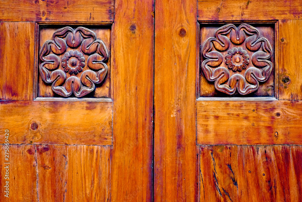 Antic old ornamental wood panels floral design.