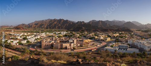 Photography View from the top on town of Hatta and rocks in the background