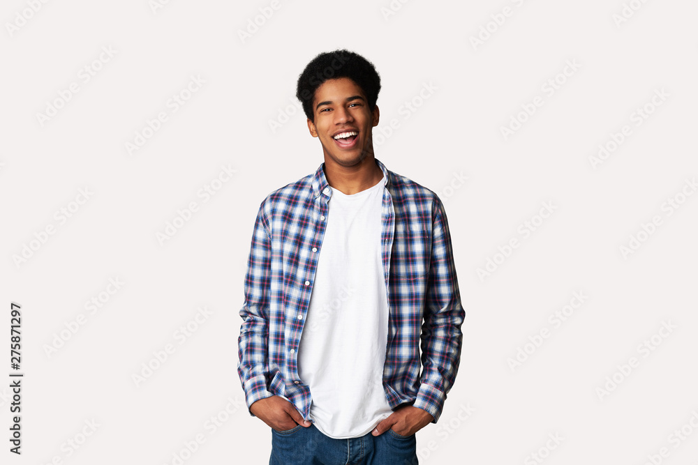 Afro Teenage Guy Posing with Hands in Pockets Afro Teenage Guy Posing with Hands in Pockets