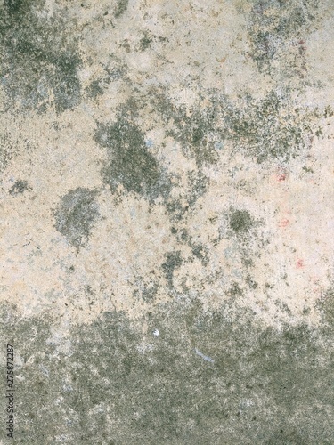 Rough gritty stone background or texture