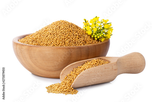 mustard seeds in wooden bowl photo