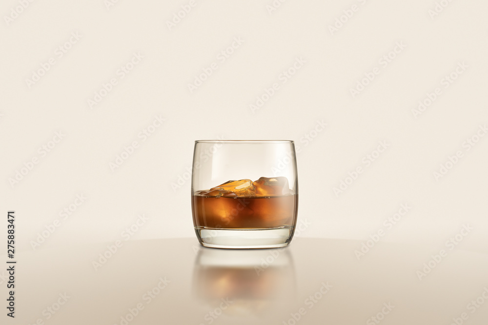 glass with whiskey and ices glass with whiskey and ices