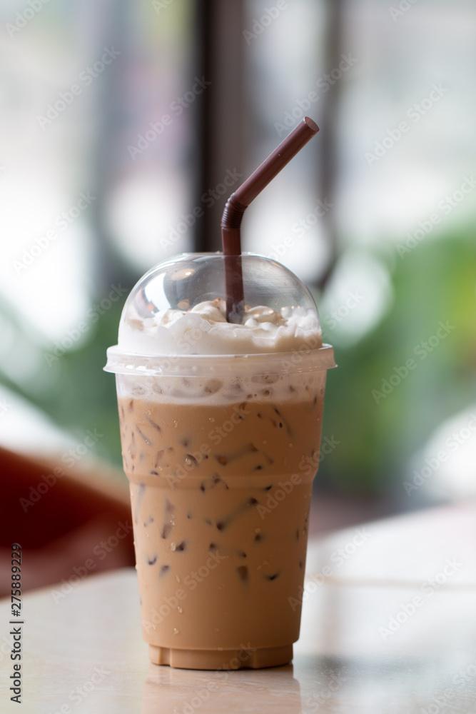 Iced coffee with milkshake, Summer refreshment drinks on desk background in cafe Iced coffee with milkshake, Summer refreshment drinks on desk background in cafe
