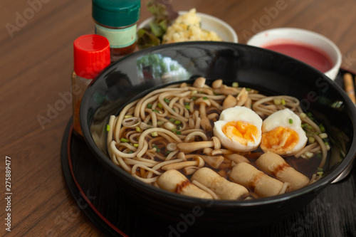 Japanese wheat noodle, Udon noodle on wooden table background