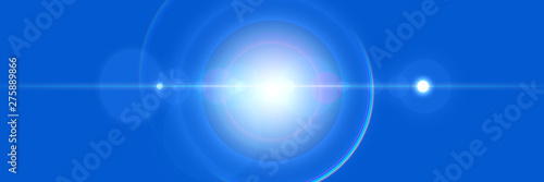 Lens flare light effect. Sun flash with ray and glow on blue sky background.