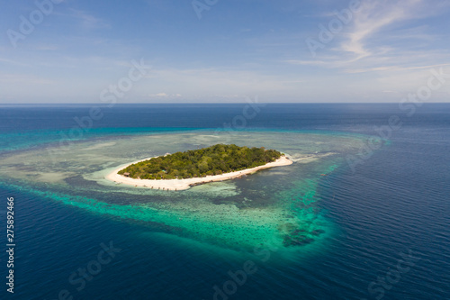 Mantigue Island, Philippines. Tropical island with white sandy beach and coral reefs. Seascape, view from above. © Tatiana Nurieva