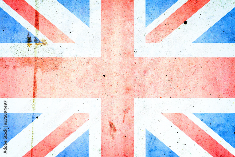 Fototapeta premium Flag of Britain on an old concrete wall. Backgrounds