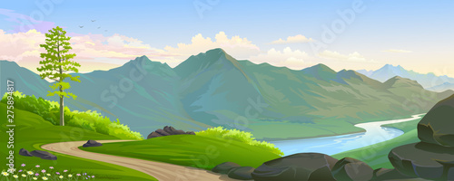 A road following a river across a hilly landscape