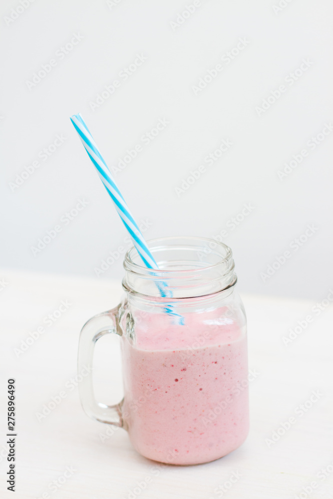 glass of milkshake on white background glass of milkshake on white background