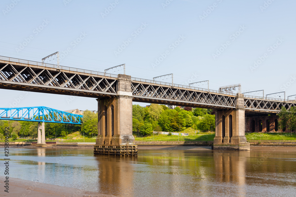 The King Edward VII railway bridge over the River Tyne. The bridge connects Newcastle upon Tyne and Gateshead. The King Edward VII railway bridge over the River Tyne. The bridge connects Newcastle upon Tyne and Gateshead.