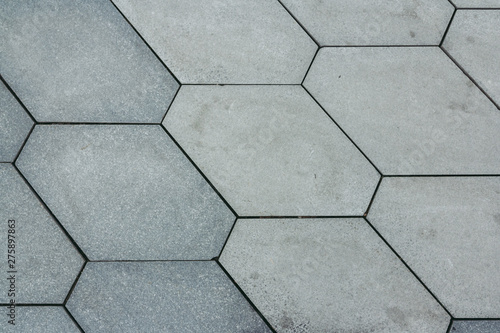 Gray Tiles granite floor background. Grey pavement tiles outdoor urban land
