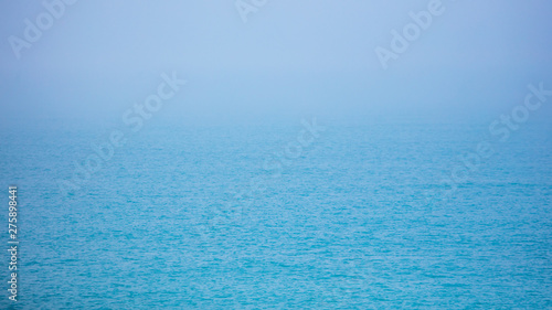 Expanse of water on the sea with a foggy horizon