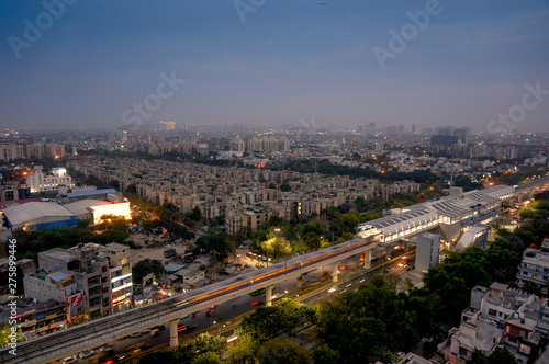 Aerial cityscape shot of Noida, delhi, grugaon at dusk night