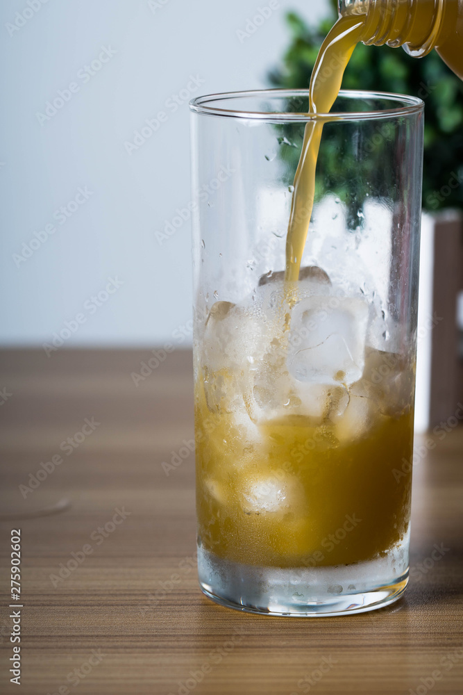 filling an empty ice cold glass with sugar cane filling an empty ice cold glass with sugar cane