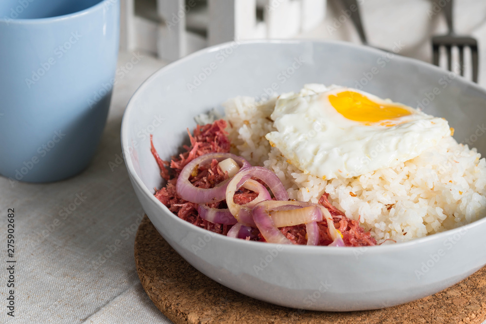 delicious morning breakfast corned beef with egg on top of rice delicious morning breakfast corned beef with egg on top of rice