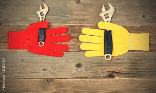 protective gloves with pipe wrench