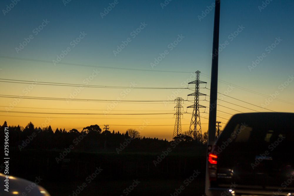 Power pylons in the sunset