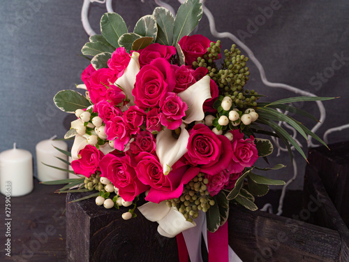 Wedding bouquet of Yak crimson roses. Copy space.