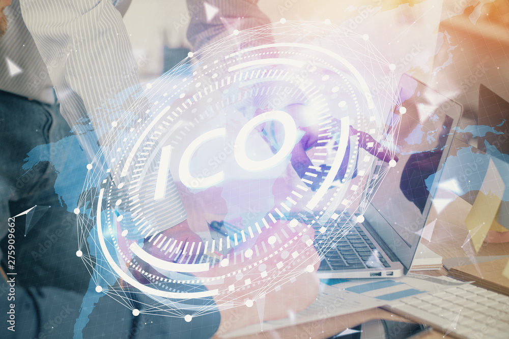 Crypto currency theme hologram with businessman working on computer on background. Concept of blockchain. Multi exposure. Crypto currency theme hologram with businessman working on computer on background. Concept of blockchain. Multi exposure.
