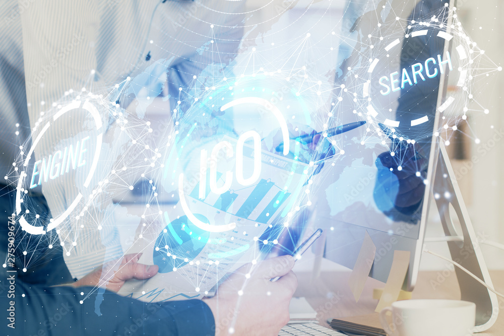Crypto currency theme hologram with businessman working on computer on background. Concept of blockchain. Multi exposure. Crypto currency theme hologram with businessman working on computer on background. Concept of blockchain. Multi exposure.