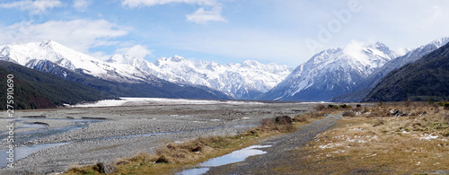 Snow capped Mountains next to the highway in Arthur’s Pass National Park, New Zealand. photo