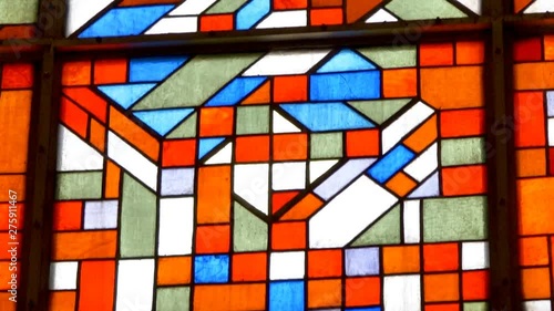 3925_Closer_look_of_the_red_and_white_stained_glass_in_Tallinn_Estonia.mov photo