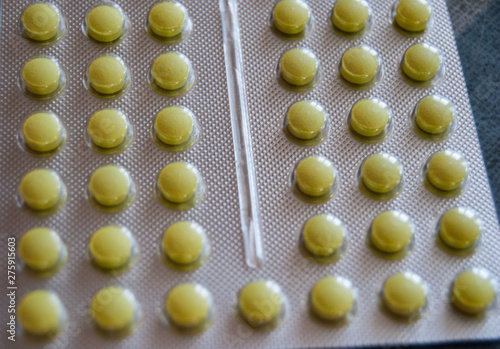 small yellow pills tablets blaster