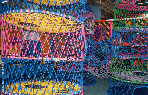 multicolored macro thread webs on a playground
