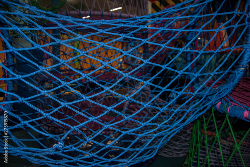 multicolored macro thread webs on a playground
