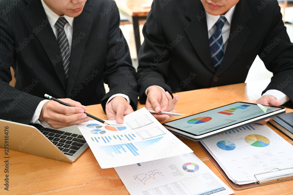 Business consult, Businessman working with finance document and tablet with meeting and planning. Business consult, Businessman working with finance document and tablet with meeting and planning.