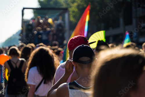 Canvas Print A crowd with rainbow flags is celebrating Pride in Barcelona