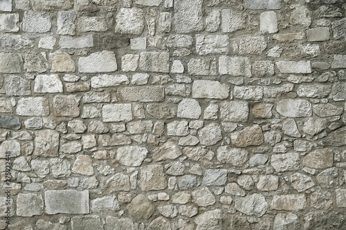 Old granite stone wall texture background
