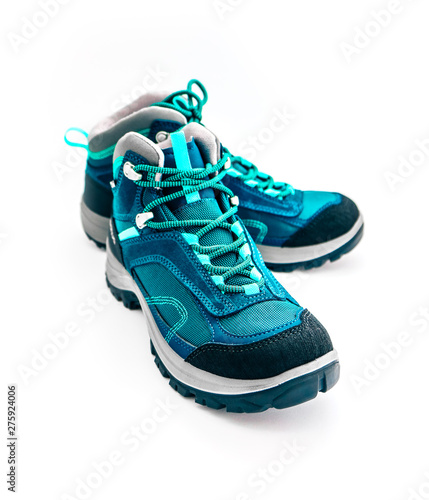 A pair of hiker green mountain sport boots, isolated on white background.