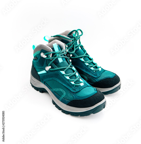 A pair of hiker green mountain sport boots, isolated on white background.
