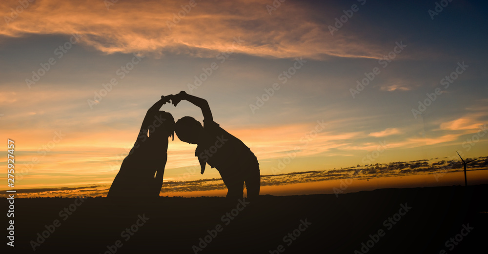 little girls holding hands silhouette