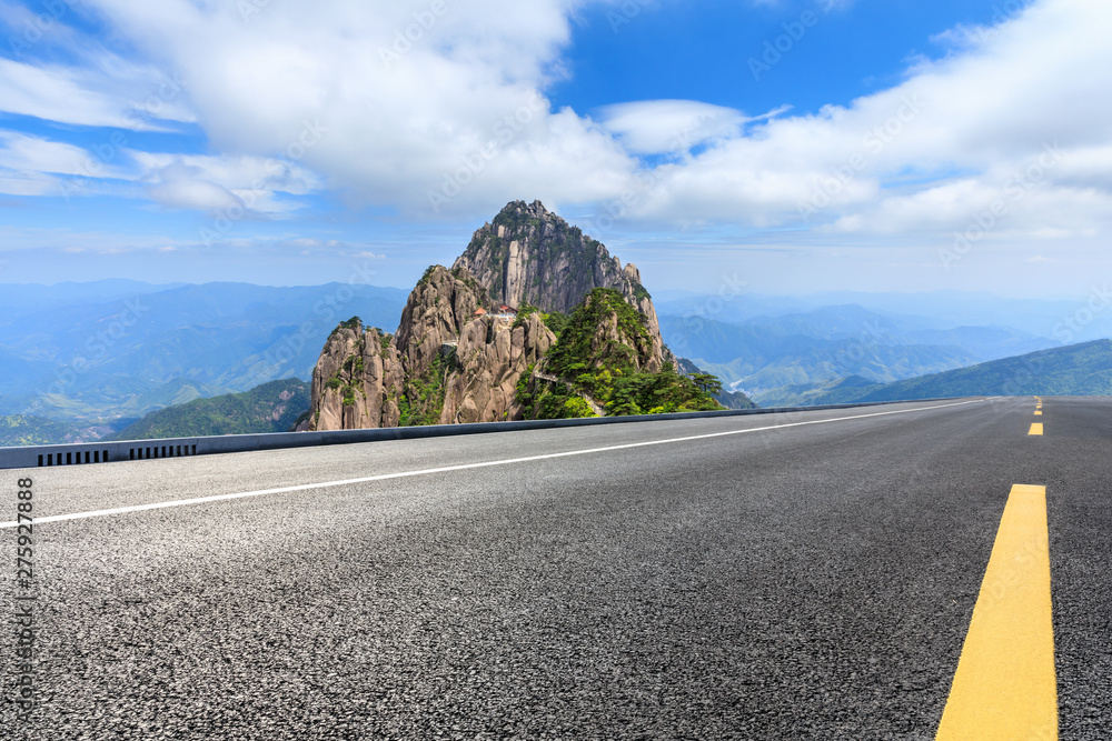 Asphalt highway and beautiful mountain nature landscape in Huangshan,Anhui,China.