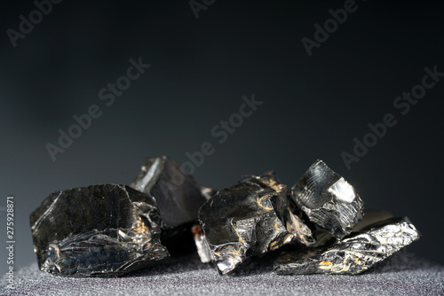 A black rock that consists mainly of carbon and was photographed in top quality .