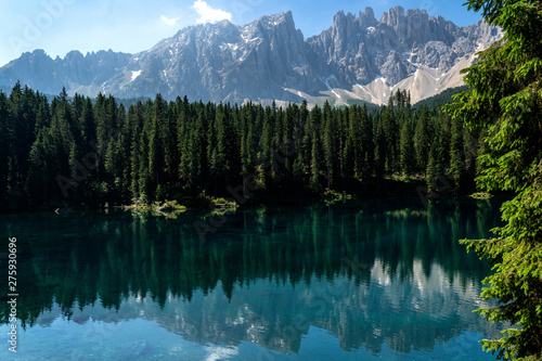 Lake Caress Dolomites Italy. Lake of Caresse in Italy. Scenic place and famous touristic destination. Primeval nature
