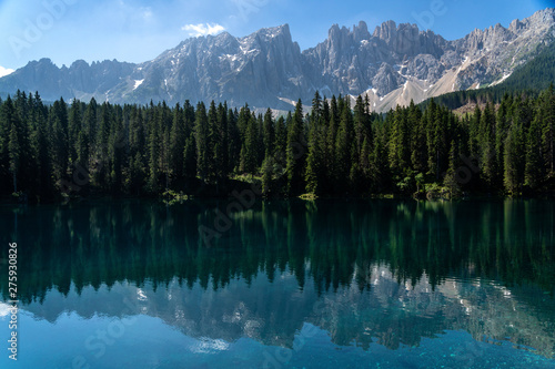 Lake Caress Dolomites Italy. Lake of Caresse in Italy. Scenic place and famous touristic destination. Primeval nature