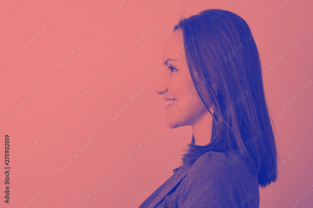 Duotone portrait of a woman in profile with space for text Duotone portrait of a woman in profile with space for text