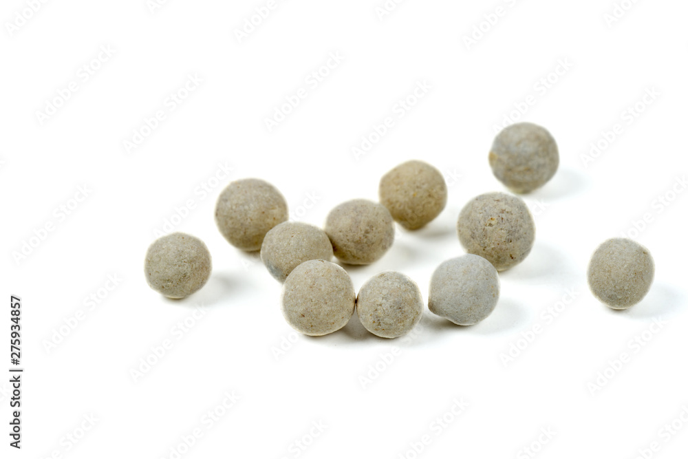 White peppers on the white background. White peppers on the white background.