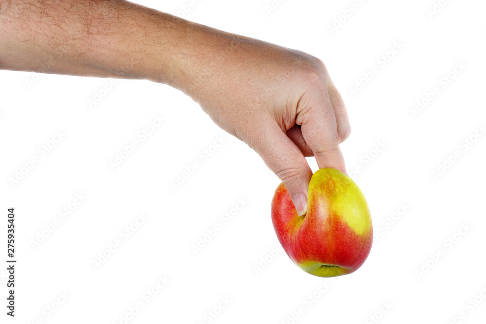 Fresh apple squeezed and deformed by mighty fingers. White background Fresh apple squeezed and deformed by mighty fingers. White background