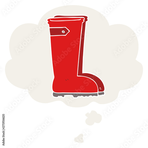 cartoon wellington boots and thought bubble in retro style