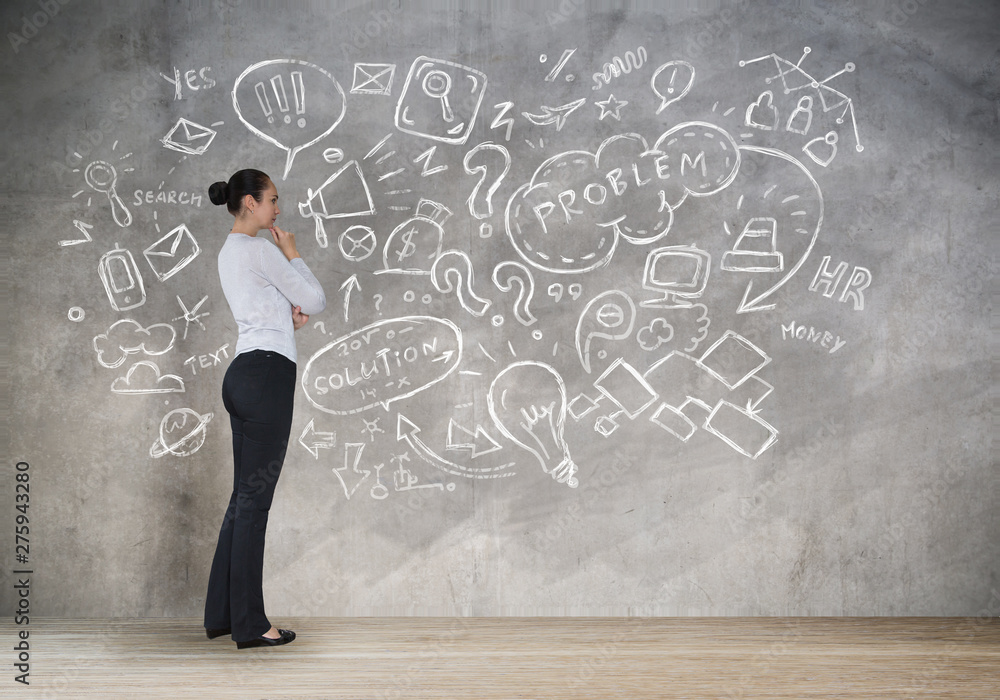 Young woman thinking over the business idea and looking at the sketch made of business and communication icons. Planning. Young woman thinking over the business idea and looking at the sketch made of business and communication icons. Planning.