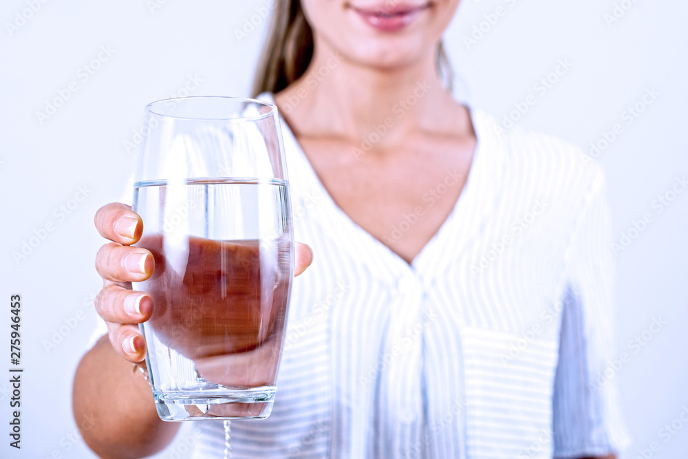 Young woman drinking glass of water Young woman drinking glass of water