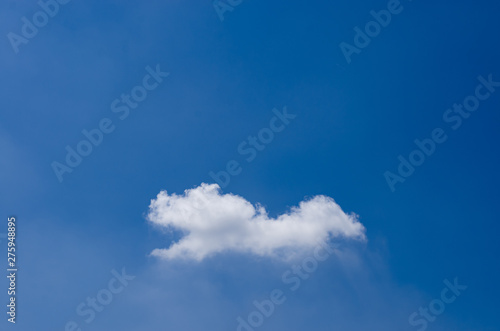 White clouds in the blue sky and blue.